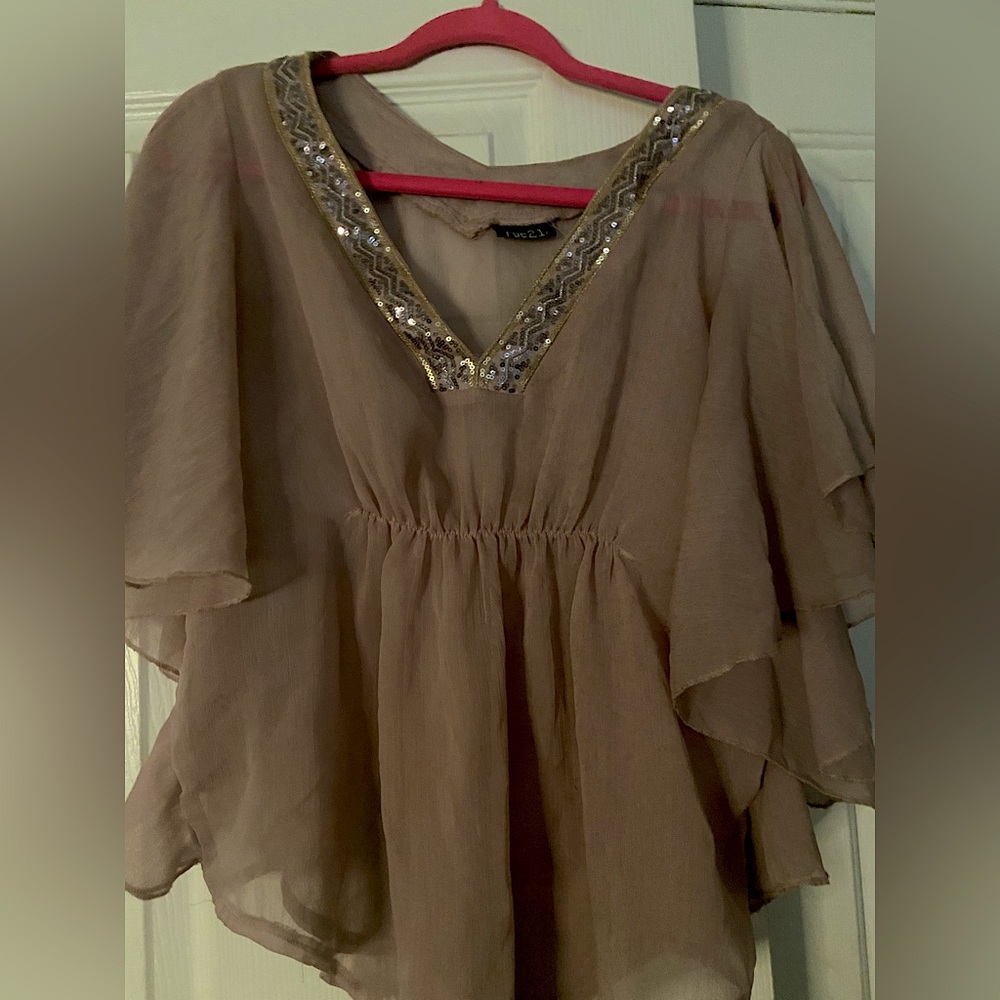 Rue21 pastel pink shear blouse with sequin around the collar